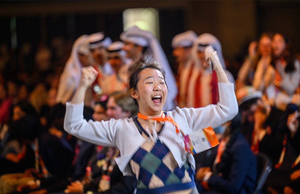 Students celebrating on stage at the ISEF awards ceremony