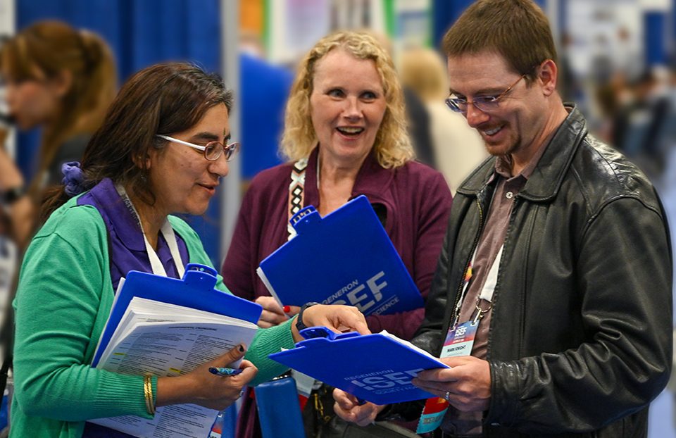 An ISEF finalist being interviewed by a judge