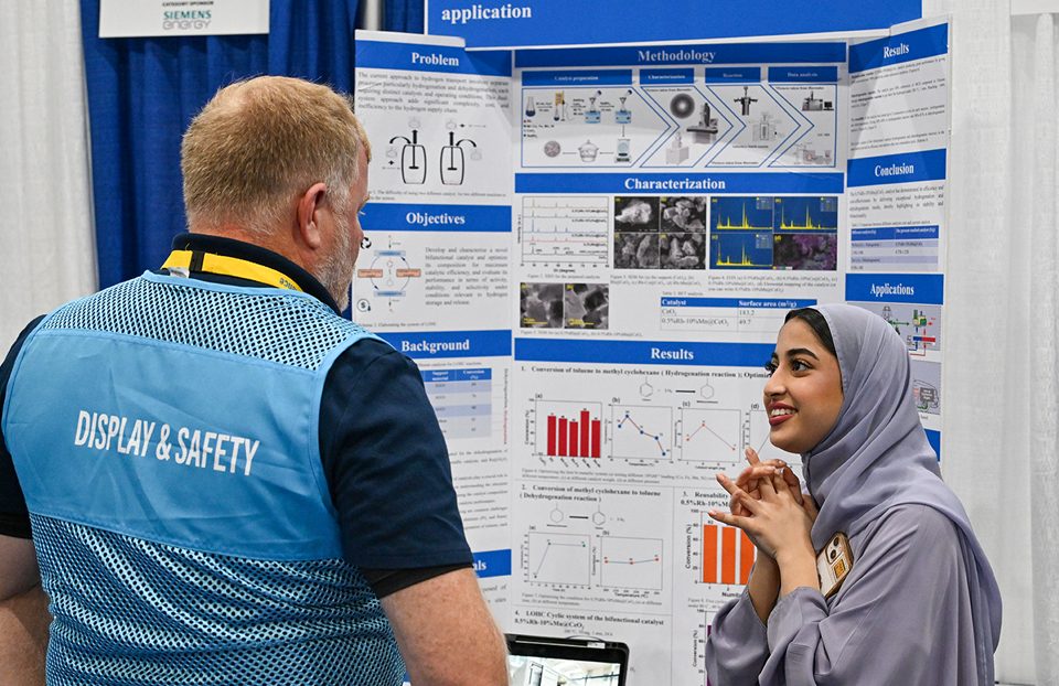 ISEF finalists setting up their research project displays at the fair